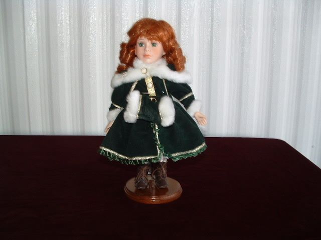 Geppeddo Doll 13 Tall Dressed in Green with Flaux Fur Red Hair Green